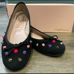 Black ballerina flats with colorful detail